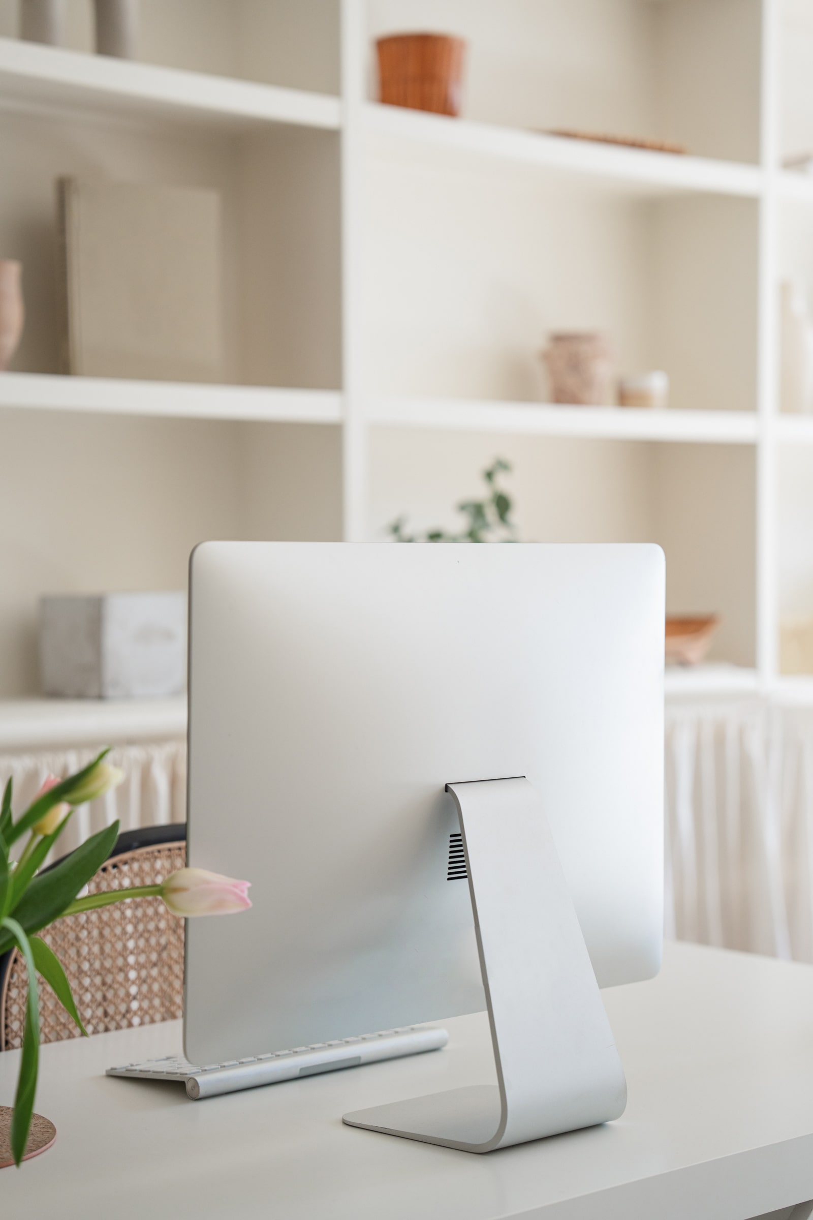 virtual assistant creating website on laptop